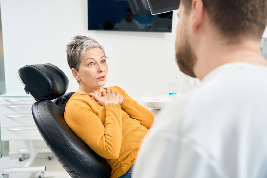 Patient getting diagnosed with oral disease